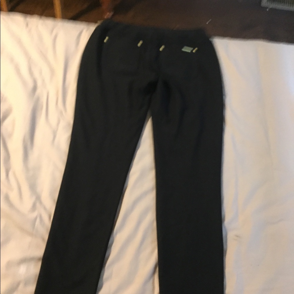 2 pairs of Michael Kors women’s pants size small